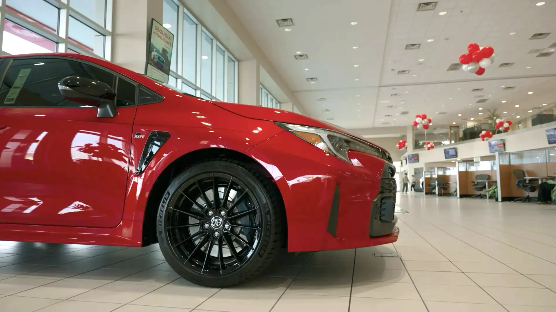 New vehicles on a dealership showroom floor